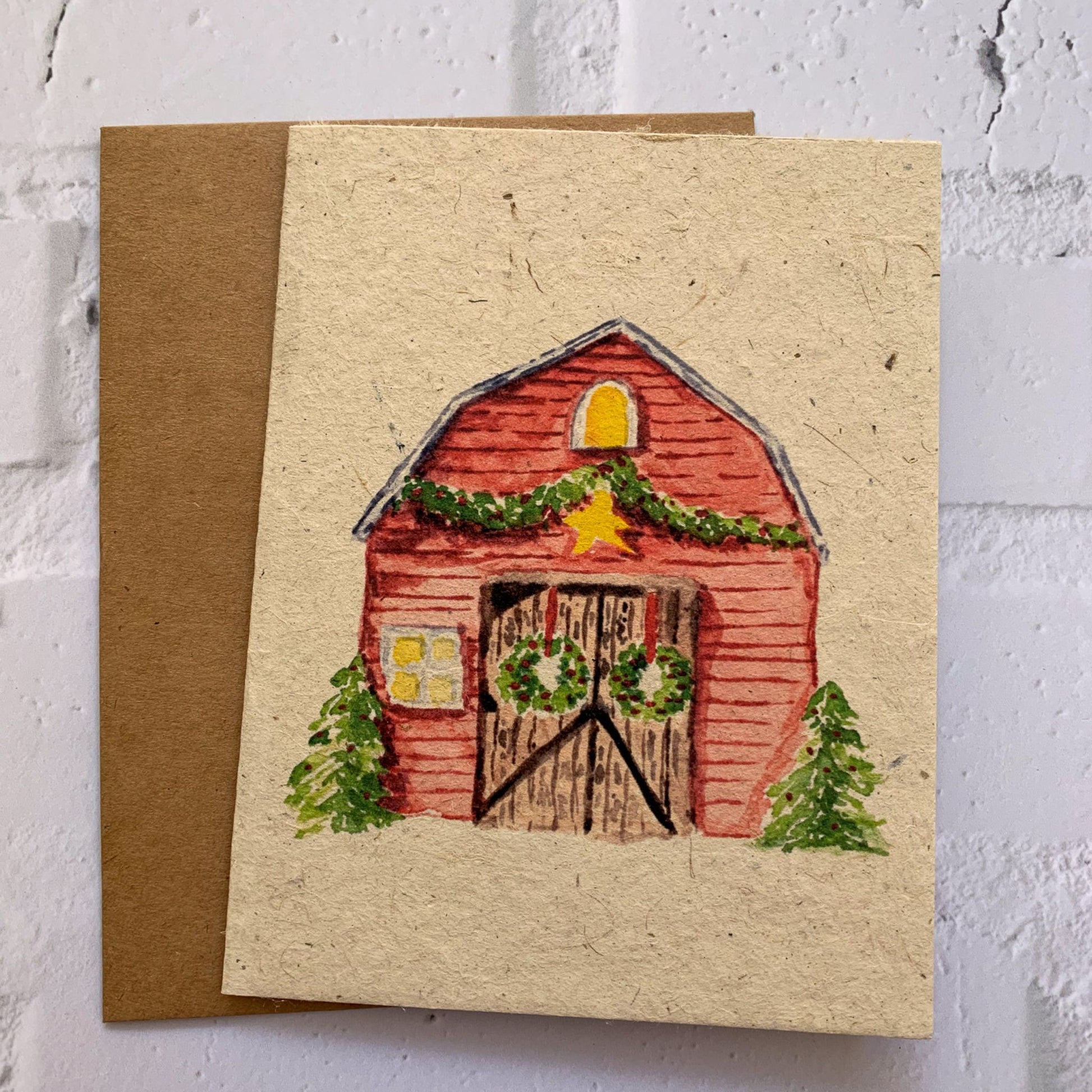 watercolor barn Christmas card with brown envelope
