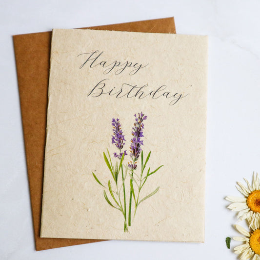 Happy birthday greeting card with vintage purple flowers printed on plantable flower seed paper.