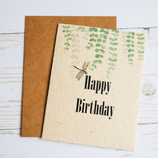 Plantable seed paper birthday card with dragonfly and greenery.
