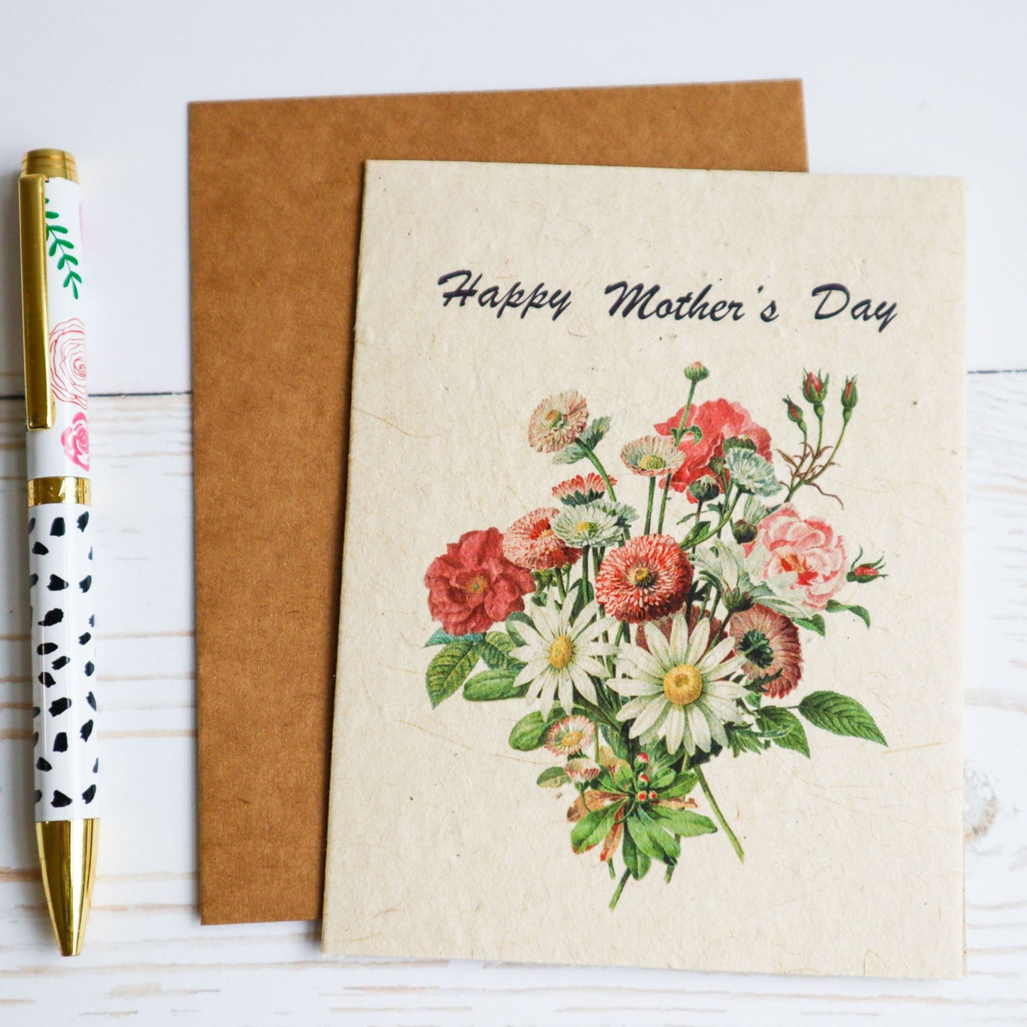 Happy Mother's Day plantable flower seed paper card with floral bouquet and kraft envelope with writing pen.
